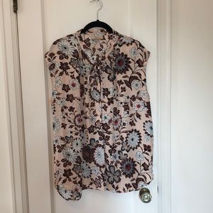 Pink floral sleeveless blouse